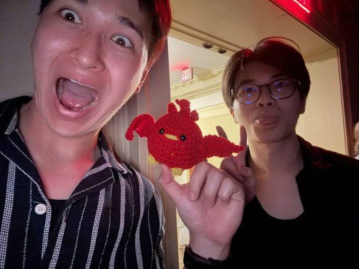 With a crocheted cardinal